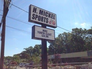 H Mickel Sports sign outside the store